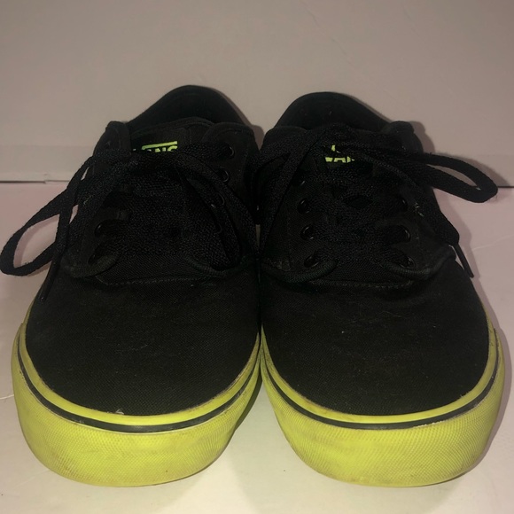 black and lime green shoes
